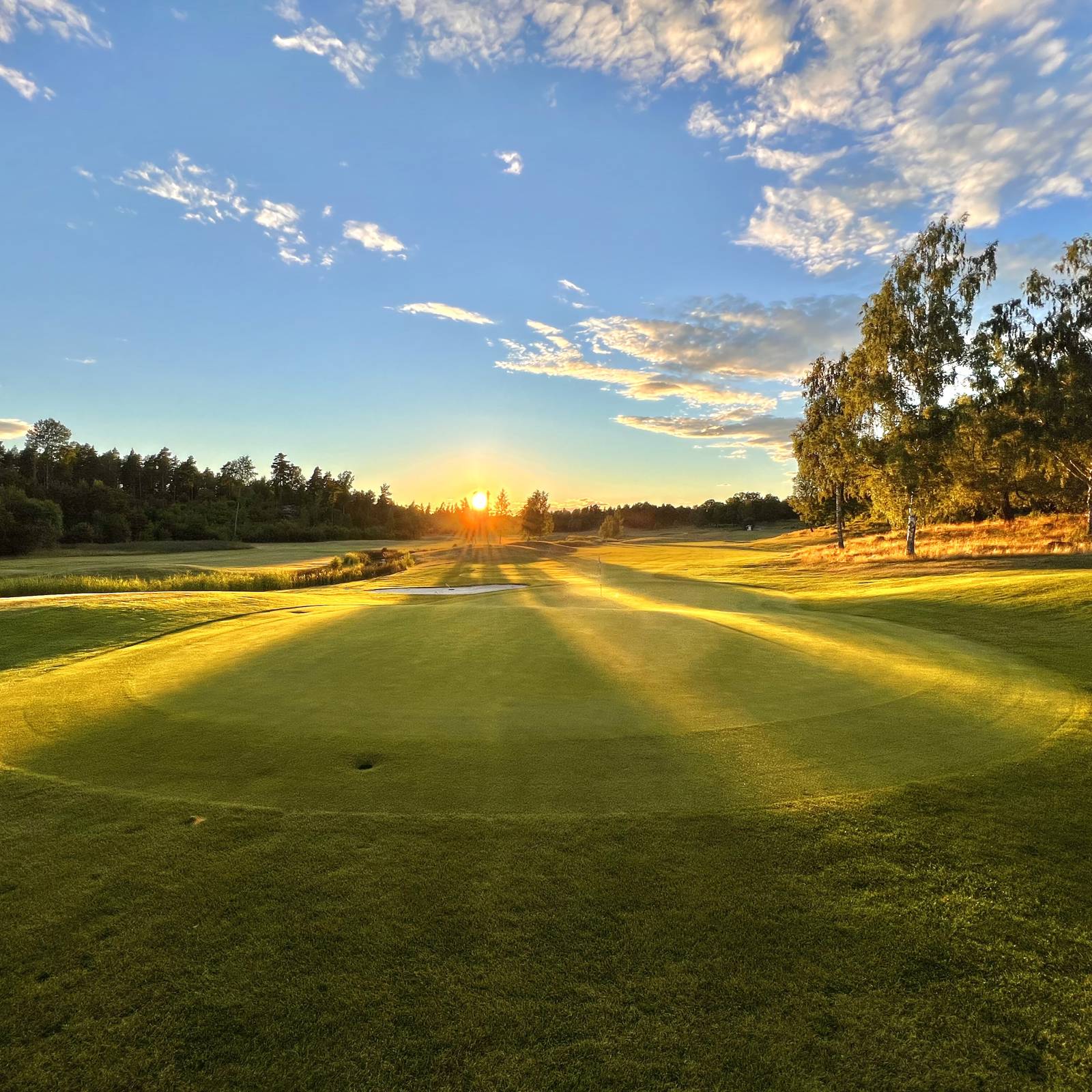 Hål 14 green solnedgång